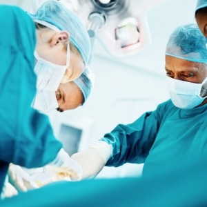 surgery doctors in blue scrubs